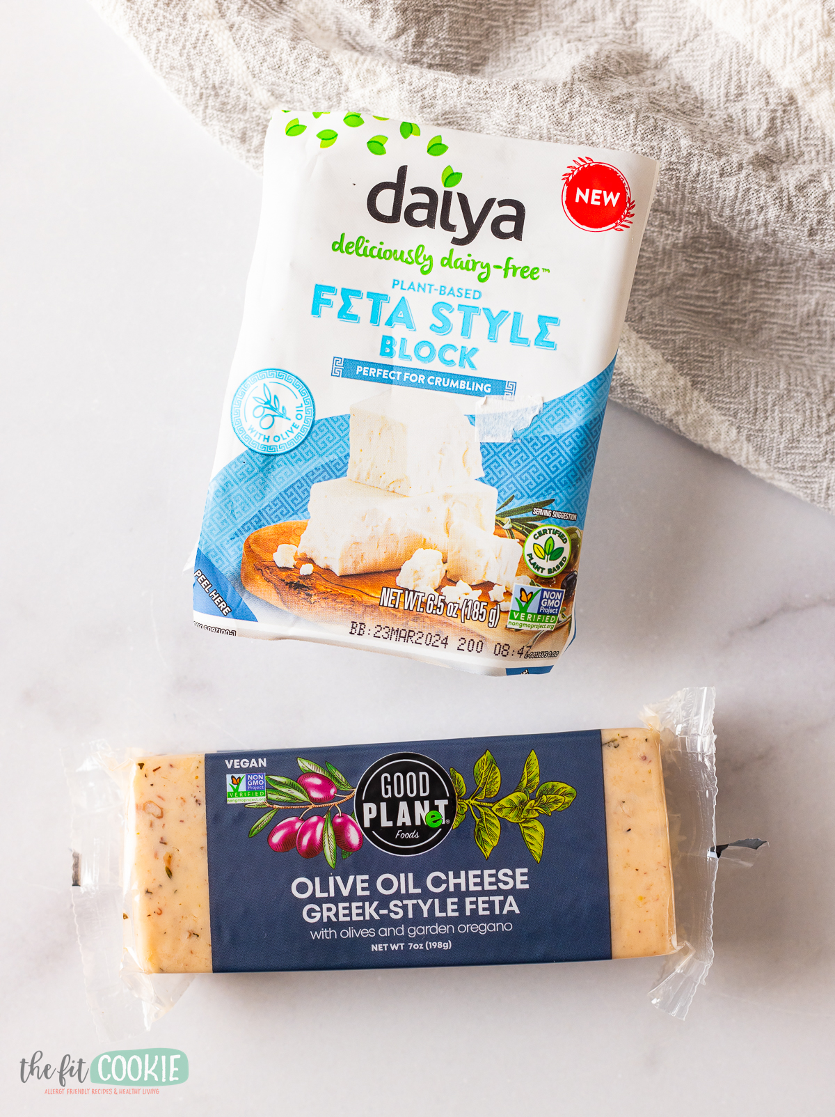photo showing 2 different brands of dairy free feta cheese.