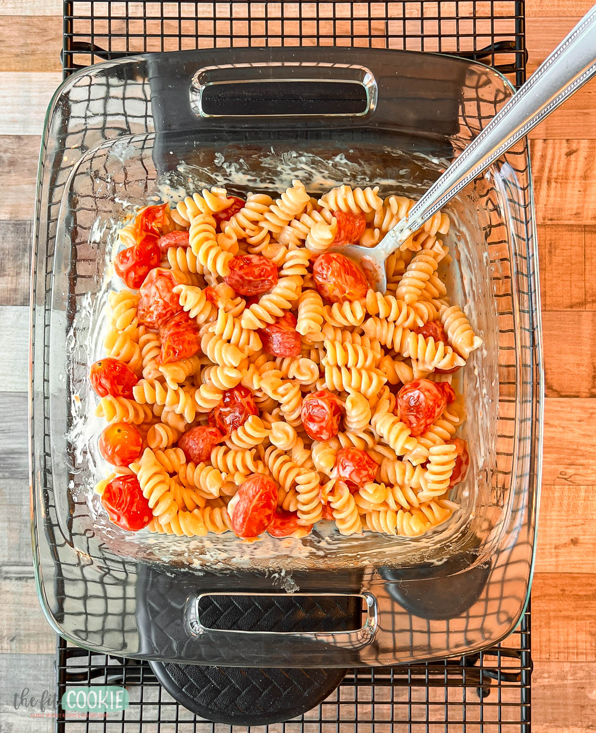 glass baking dish filled with dairy free feta pasta made with babybel plant based cheese.