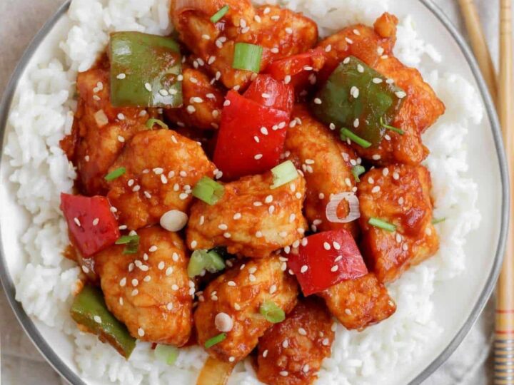 Chinese chicken stir fry with peppers and rice.