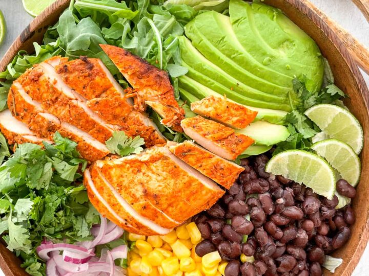 Mexican chicken salad in a wooden bowl.