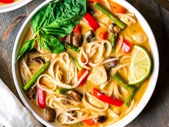 A bowl of soup with noodles and vegetables.