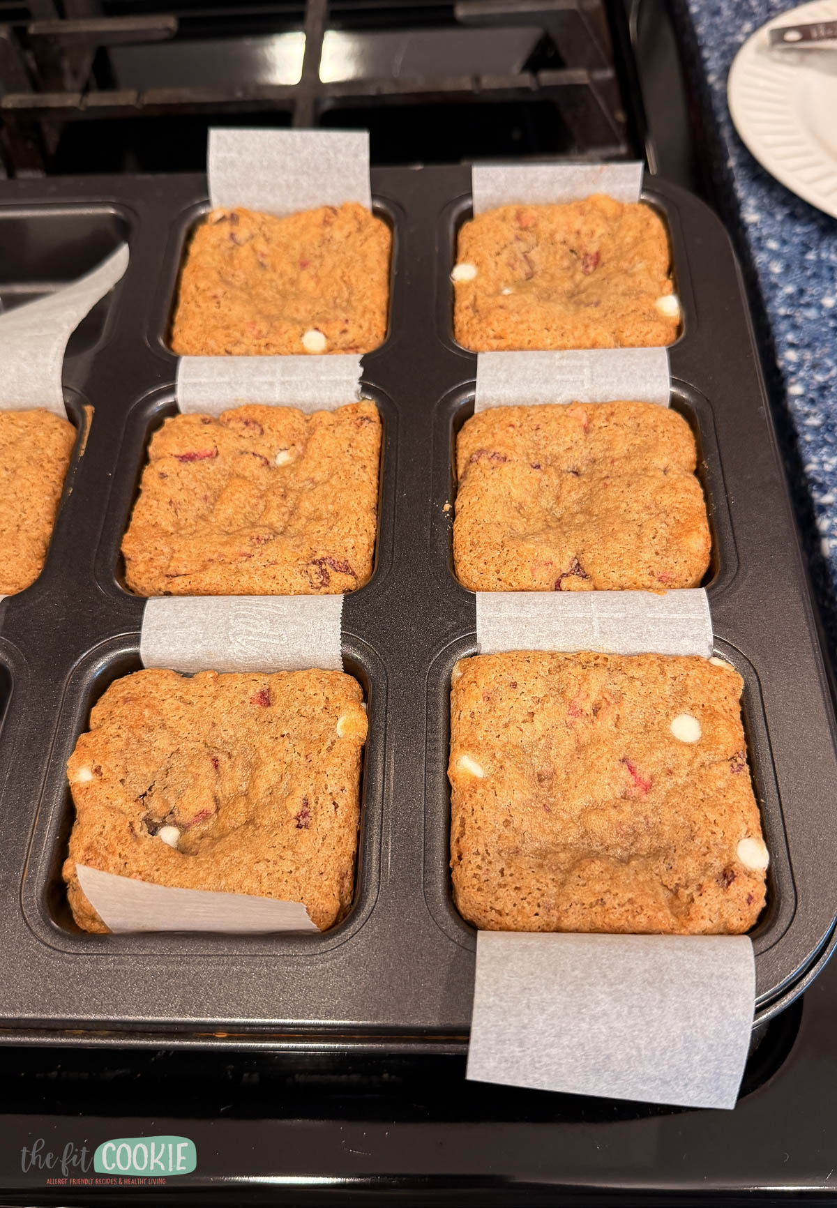 white chocolate strawberry blondies baked in a brownie pan.