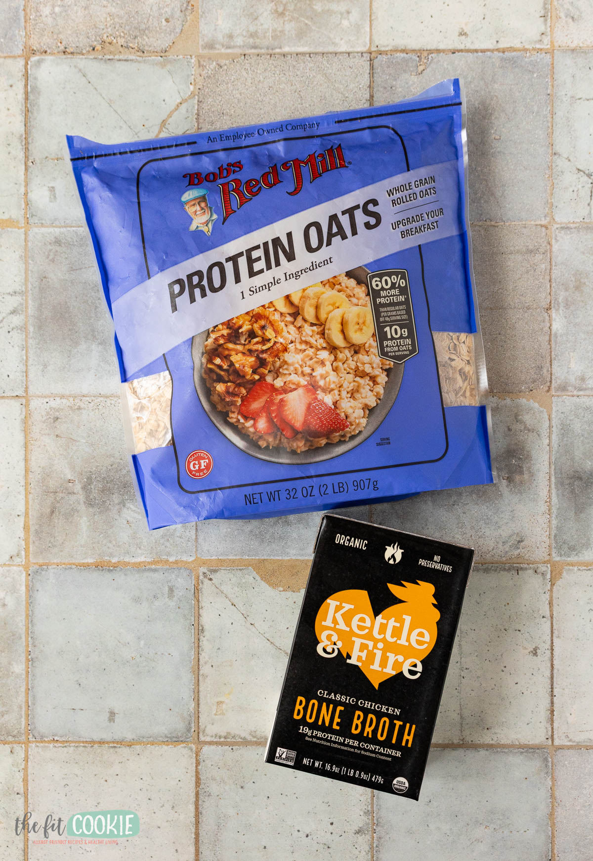 photo showing a package of Bob's red mill gluten free protein oats and a carton of Kettle and Fire chicken bone broth.
